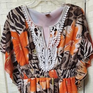 Fun & Flirt printed short dress, warm colors (orange, browns,and beige Size L